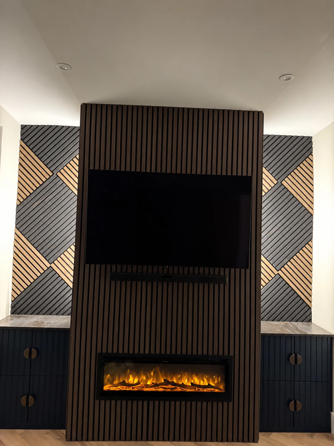 Bespoke media wall with fireplace and cabinetry